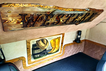 Text engraved on a wooden board