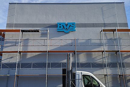 Backlit BVS logo made of plastic