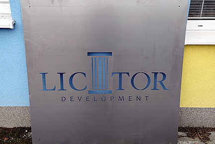 Steel logo cut into a metal sheet