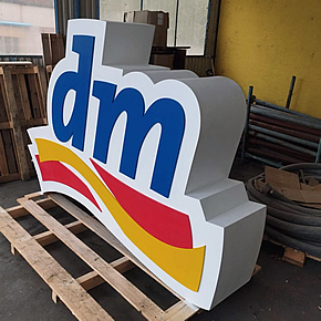 Large 3D logo made of wood and plastic