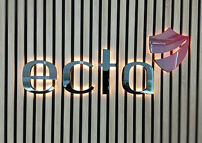 Backlit logo with metallic effect